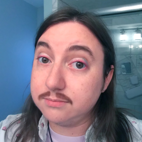 its me haha im a white guy with long brown hair a mustache and freckles